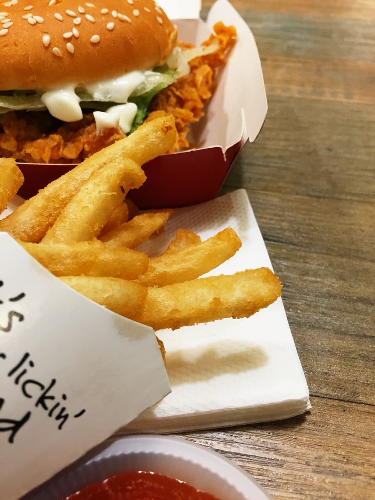 A KFC Zinger burger with fries