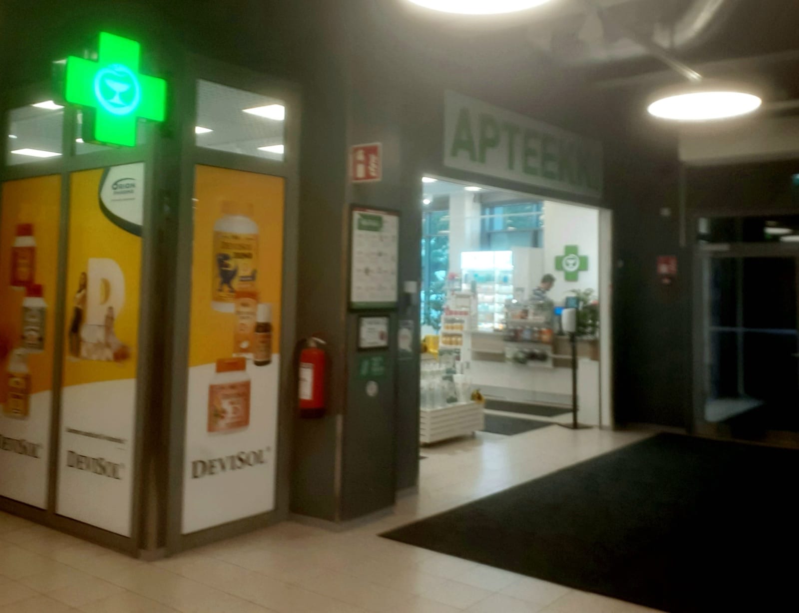A pharmacy interior — the credibility-granting channel of European supplements